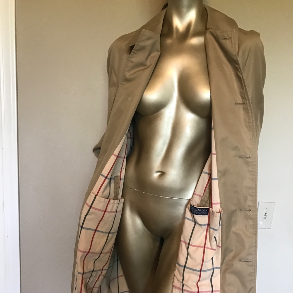 Burberrys' tan overcoat with nova check lining